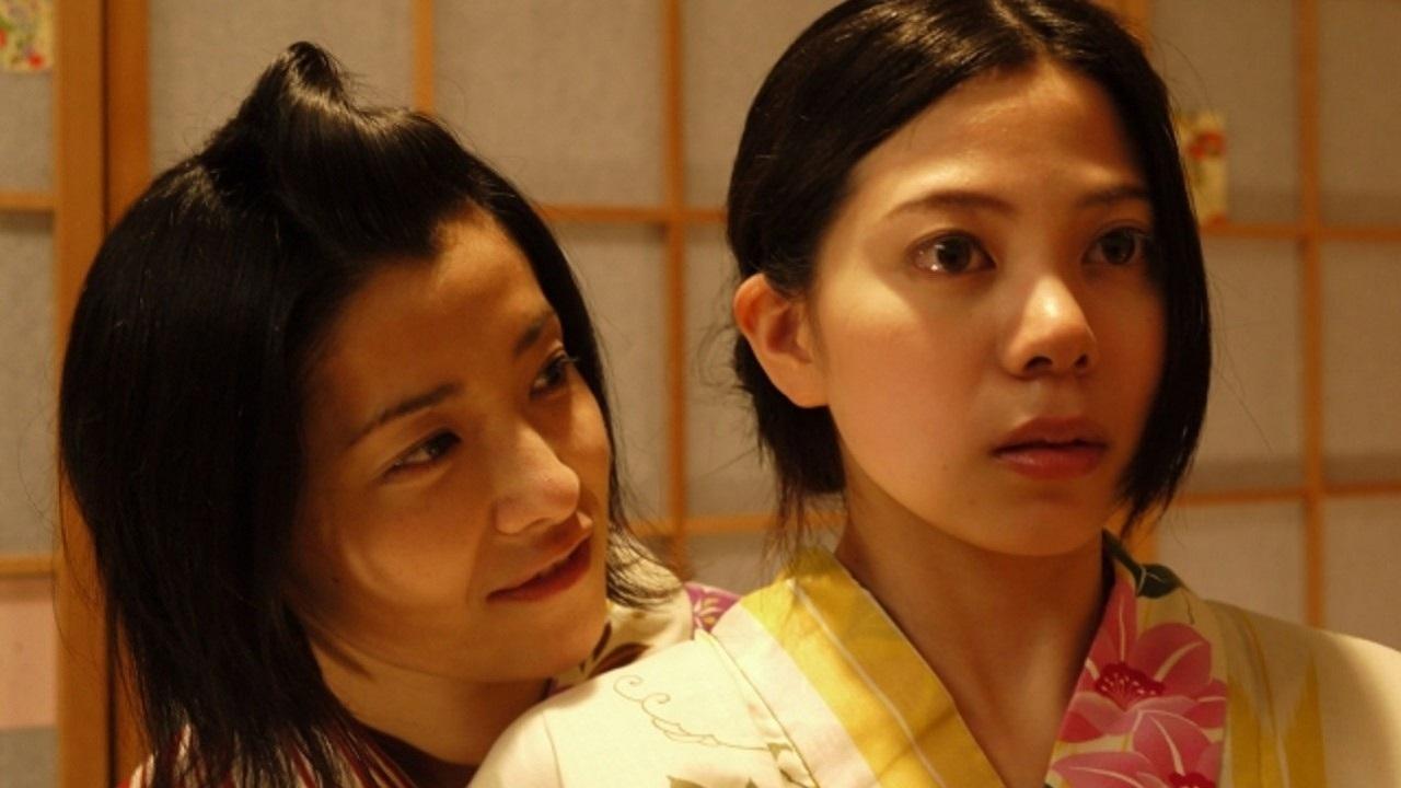耳をかく女|耳をかく女